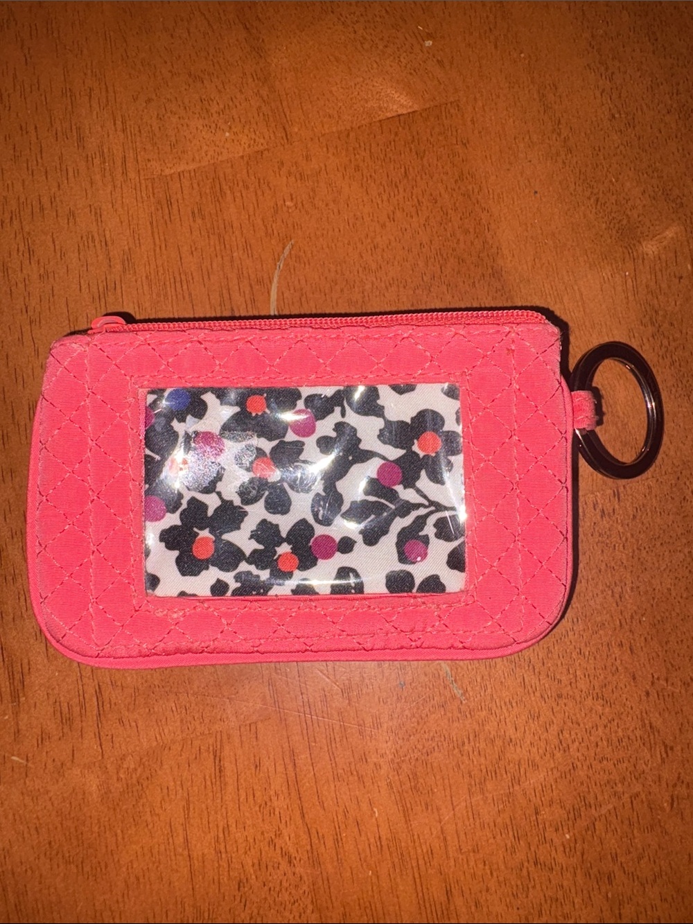 Vera Bradley Zip ID Case in a vibrant coral quilted pattern